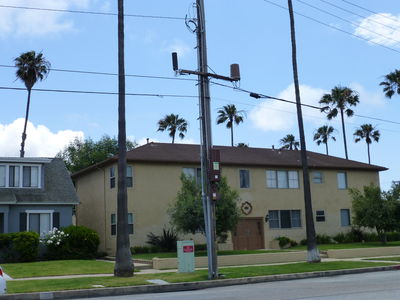 This is an example of why the assertion that 'DAS and done' is not always true.  This site was originally permitted as a single DAS site, but another carrier wanted to be at the same site, so a larger cabinet holding two DAS nodes was installed, as was a second antenna.
Keywords: nextg crown castle dual das node redondo beach