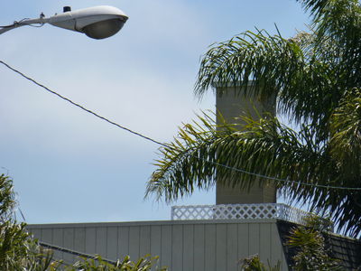 Chimney Site with Elevated BTS Platform - Hermosa Beach, California
This site features a chimney to hide the antennas (except from behind) and an elevated BTS equipment cabinet platform.
Keywords: chimney elevated platform bts hermosa beach