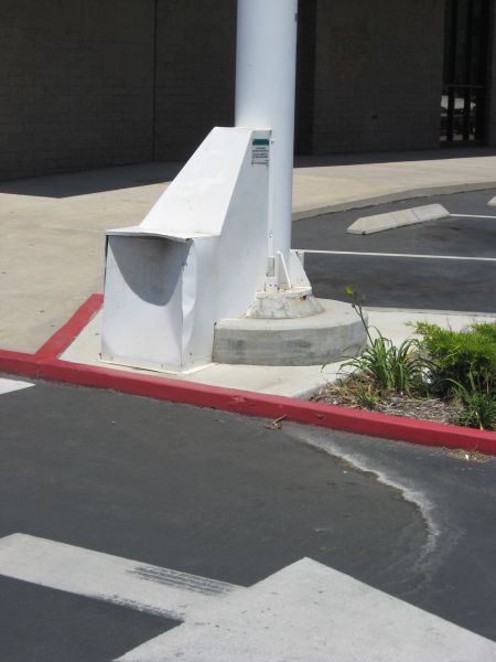 One bump too many
This Cingular site cable transition to a flagpole site at the USPO in San Marcos, California features impacts.  It's too close  to the driveway. 
Keywords: cingular san marcos uspo flag flagpole pole