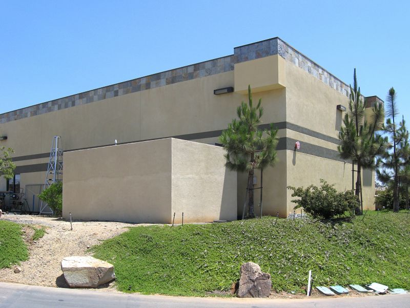Sprint on a building
This is a Sprint site in San Marcos, California. The BTS equipment cabinets are within in the CMU walled enclosure at ground level; the antennas are inside the surface mounted box on below the top of the building.  This site is co-located with a Cricket Wireless monocypress site.
Keywords: san marcos sprint building
