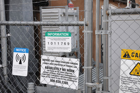 A Tower That Helps Birds!
This is American Tower's "Taos Center" tower site in, ah, Taos (New Mexico).  It's most unique feature is the federally protected bird's nest on the tower.  Here's the sign warning against climbing without permission.
Keywords: federally,protected,bird,bird's,nest,taos,new mexico,nm,american tower