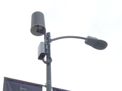 Verizon 'Small Cell' (Really a DAS node)
Strapped on to a City of Los Angeles light standard.  Cables are routed inside the pole to and through the top cap.
Keywords: verizon light standard pole strap das led