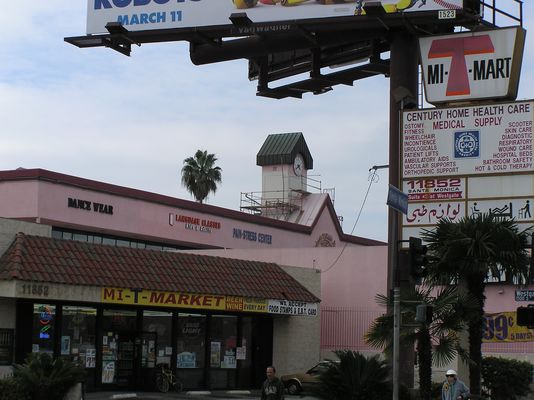 1. Antennas to be Hidden in Clock Tower
Three of four sides of the exsting clock tower had walls partially removed to permit the installation of RF-transparent fiberglass panels.  As you'll see later, once the antennas are installed behind the panels, the panels are painted and textured to match the rest of the structure, thus hiding the antenna locations.
Keywords: verizon armacost