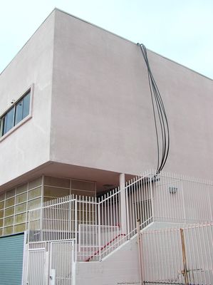 2. Routing the Antenna Cables up to the Roof
The coaxial cables for the antennas, including the GPS antenna, are loosely placed against teh wall going up to the roof.  As you'll see later, these cables will be secured in a cable tray.  At this time the GPS antenna is not yet installed.
Keywords: verizon armacost