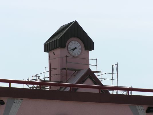 15. Clock Tower Painting Underway
The panels are fully installed and are being painted and textured to match the building.
Keywords: verizon armacost