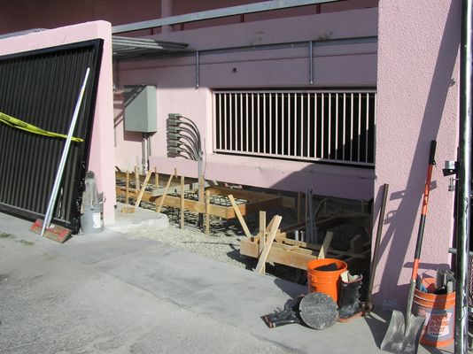 24. It's Concrete Pour Day...Again
The wood frames are in place and braced for the pour...again.  Notice the very nice cable terminations at the far end of the cable tray.  You'll see these again, later.
Keywords: verizon armacost