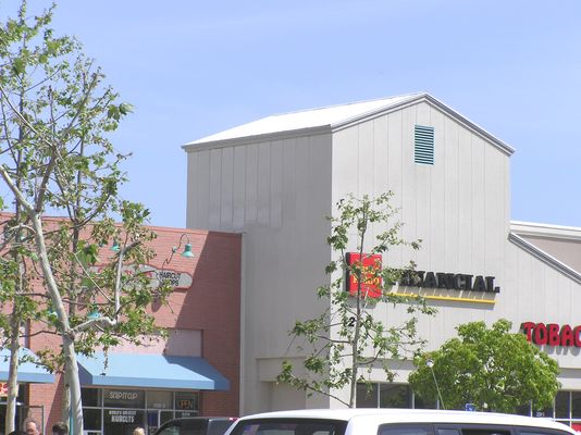 Camo, almost matching... (2 of 2)
This Cingular site is a good example of the need to carefully plan how much of an existing wall will be replaced with a fiberglass camo panel.  In this case, the cut out portion of the wall, now replaced with a painted/textured RF transparent panel, is clearly visible.  A better approach would have been for the carrier to cut from wood panel edge to panel edge so that the difference, if visible, would have been more uniform.
Keywords: cingular simi valley camo panel