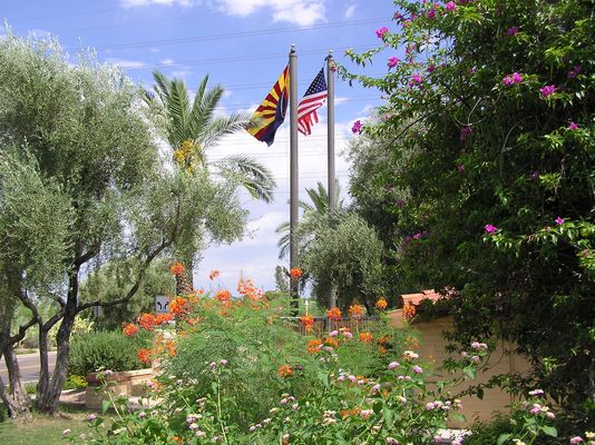 Proud Waves From Sprint (2 of 3)
Sprint's installation at the Scottsdale Ranch Community Center features two flagpoles in a nicely landscaped area adjacent to a lake.  
Keywords: sprint scottsdale ranch community center arizona flag flagpole pole poles flagpoles