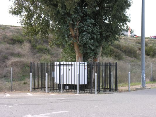 A Sassy Power Generator
Verizon's Sassy site features this remote power generator.  Note that the fuel tank isn't here, but rather it's located in the main BTS fenced area about 50 feet away (and to the left of this view).
Keywords: verizon sassy Lake Elsinore standby power generator