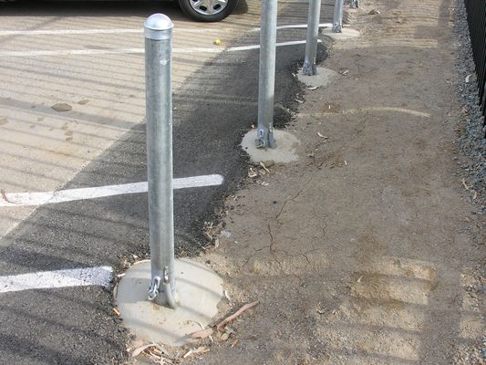 Verizon's Sassy Site: Grounded Bollards
The traffic bollards at Verizon's Sassy site are grounded.  This helps to prevent RF hot-spots near the antennas.  Of course, the bollards also help to deter unwelcome vehicle-visitors!
Keywords: verizon sassy Lake Elsinore bollards