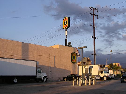 Super Signal From Super 8
Cingular built this camo site below a sign at the Super 8 Motel in Azusa, California.  For some reason the radome cover is missing, exposing the three sector antennas to public view.
Keywords: Cingular Azusa Super 8 Motel Sign