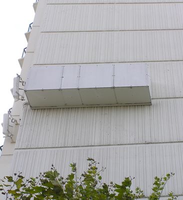 Multi-carrier Cell Site Cleverly Disguised As An Upscale Hotel
Looking south at north wall.  Corner reflector antennas on the left; camo box in left center.
Keywords: multicarrier torrance hotel hilton