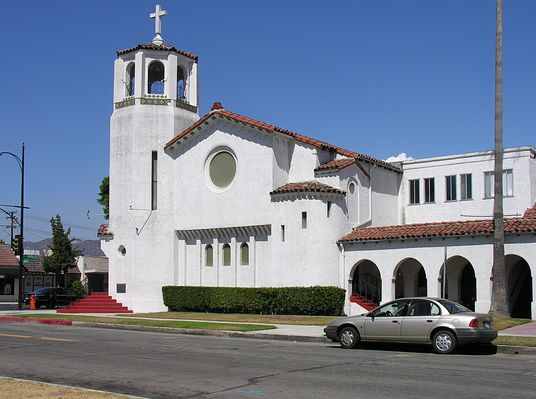 The Word Rings Out From T-Mobile
T-Mobile's exterior box design is spoiled by the visible antenna cables and tower mounted amplifiers in plain view.  A little work would make this a nice site on a church bell tower.
Keywords: 2828 W. Maginolia, Burbank