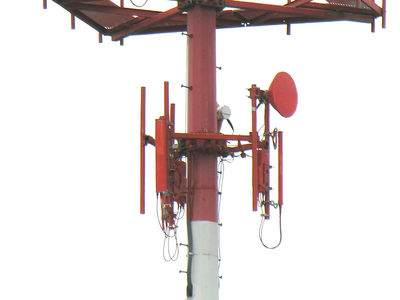 So, it works in orange, too!
This is a Clearwire site near the Portland, Oregon airport (PDX).  Sites near airports are sometimes required to be painted with aviation orange and while to make them more visible to pilots.  Clearly seen in this photo are Clearwire's on panel-per-sector deployment for serving the customers in the area, and two backhaul microwave antennas to link this site to other site, and on to the Clearwire POP ("point of presence") connecting to the Internet. 
Keywords: clearwire portland orange while aviation microwave backhaul