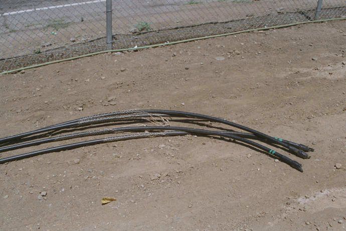 Color coded coax cables will pulling grips
The coax cables are ready for installation in the trunk of the monopalm.  Each cable is color coded at both ends to aid in identification.  The pulling sleeves ("Chinese finger grips") will be connected to the pulling rope.
Keywords: coax cable chinese finger grips pulling rope color coded trunk monopalm