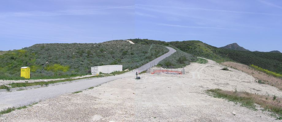 KMLT Almost Buried -  Just a few weeks of work left!
The underground transmitter building is almost complete.  Just waiting on the stairs and hatch to be installed.  The fencing is still not in final shape at the antenna.  Most of the construction 'stuff' has left the site for points unknown.  April 2005.
Keywords: KMLT