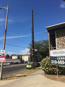 Mobilitie New Wood Pole Pox in West Los Angeles
Mobilitie has planted this awful wood pole in West Los Angeles.  Note the standoffs for the equipment and conduits.  A small cell? I think not. 
Keywords: mobilitie wood pole sprint west los angeles