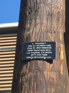 Mobilitie New Wood Pole Pox in West Los Angeles
Mobilitie has planted this awful wood pole in West Los Angeles.  Note the standoffs for the equipment and conduits.  A small cell? I think not. 
Keywords: mobilitie wood pole sprint west los angeles