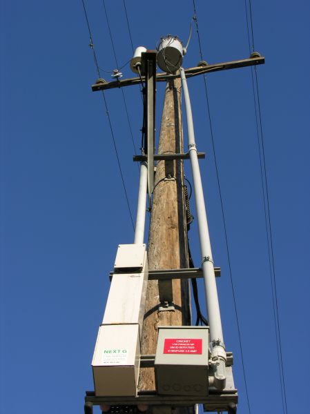NextG Distributed Antenna System Node
NextG's DAS node located in Encinitas, California.  The carrier supported by this node is Cricket Wireless.  The DAS equipment manufacturer is Andrew Corporation. This DAS node is a member of Andrew's ION ("Intelligent Optical Network") line of products.  The cover at the top of the DAS housing covers a cooling fan.

Under SDG&E rules, this site does not consume enough power to require a power meter; merely a breaker box (located to the right of the DAS node).
Keywords: nextg das distributed antenna system encinitas node fiber cricket andrew ion intelligent optical network cooling fan sdg&e power meter breaker box