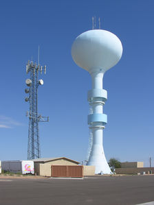 Lots of Signals
This multi-carrier, multi-owner site is in Mesa, Arizona.  The tower registration shows Verizon as the anchor of the lattice tower.  The City of Mesa has multiple sites on the top of its water tank.
Keywords: verizon city of mesa arizona lattice tower water tank