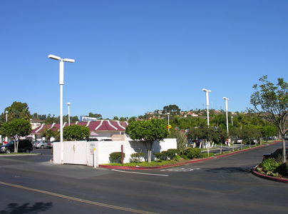 McCell Site
T-Mobile's McDonald's site in Del Mar, California.  The antennas are in the three radomes atop the parking lot light standards.  The base station equipment is housed in the CMU wall extension behind the trash enclosure.
Keywords: T-Mobile's McDonald's site in Del Mar California light standards