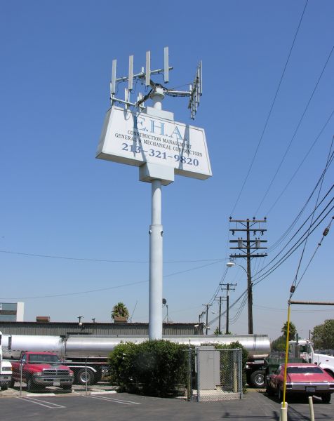 Sign me up!
Sprint's site, at the intersection of I-405 and I110 in Gardena, California, is built atop a commercial enterprise sign.  See: http://maps.google.com/maps?f=q&hl=en&geocode=&q=gardena,ca&sll=37.0625,-95.677068&sspn=29.025693,55.107422&ie=UTF8&ll=33.857997,-118.283083&spn=0.000873,0.002701&t=h&z=19&iwloc=addr&layer=c&cbll=33.857997,-118.283083&panoid=cnzdeipYOjdDXyBwyMclfQ&cbp=12,307.77006332815694,,0,-20.14375050524673
Keywords: Sprint gardena anelo