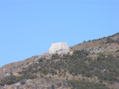 Monorock, Interrupted
Sprint has demonstrated that it can build very nice monorock sites.  This isn't one of those good sites.  Too many square edges, and not continued around the back enough to hide the edges from passersby.  For an example of how Sprint does this type of design correctly search this site for "Now You Don't See It, and Now you Don't!" 
Keywords: sprint monorock rock murrieta