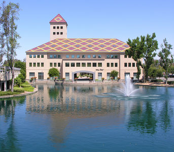 A Tower that's Really a Tower
AT&T and Sprint occupy the tower above this building in Temecula, California.  The antennas are located adjacent to the 'windows', and the equipment cabinets are hidden by the roof parapets.  The name of the center is, oddly, the Tower Plaza! A very good design, indeed.
Keywords: at&t sprint temecula tower building camouflaged