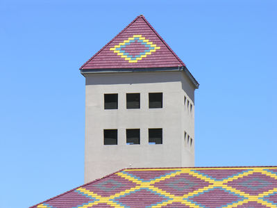 A Tower that's Really a Tower
Close up of the tower enclosing the AT&T and Sprint antennas in this tower above a building in Temecula, California.  The antennas are located adjacent to the 'windows', and the equipment cabinets are hidden by the roof parapets.  The name of the center is, oddly, the Tower Plaza! A very good design, indeed.
Keywords: at&t sprint temecula tower building camouflaged