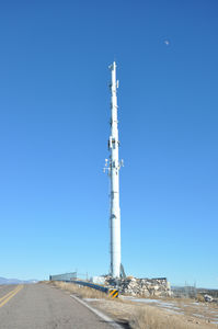 A Terrible Missile Rises Over the New Mexico Horizon
This is a monster of a visible site.  It stands 150 feet tall and is located on the I25 Frontage Road east of County Road 57 south of Santa Fe, NM.  There is another photo in this gallery showing just how awful this site is from afar.
Keywords: Alltel,santa fe,monopole