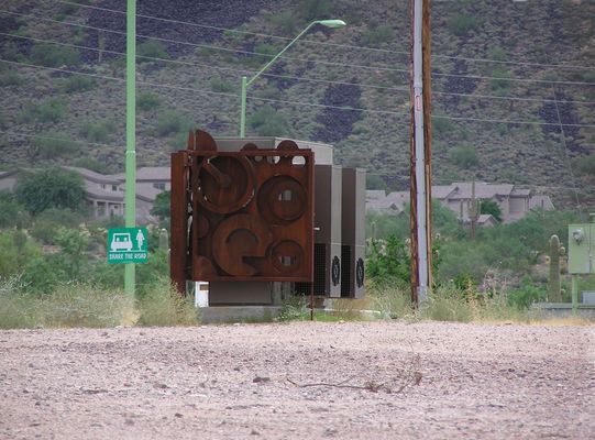 Great Scott!  (Some more)
This close-up view shows a very stylish use of an iron sculpture to provide an interesting surround to a cell site BTS.
Keywords: scottsdale arizona iron scupture