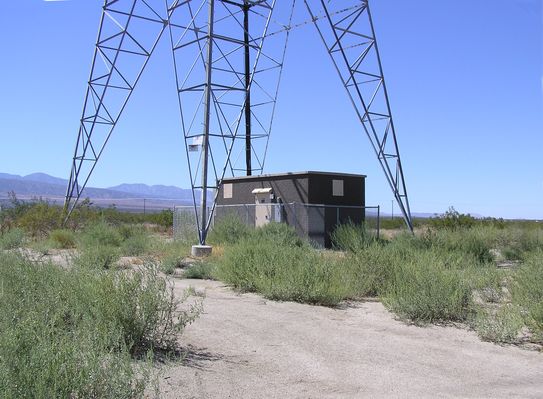Power Transmission Tower Site
Nextel's BTS equipment shelter is constructed between the legs of this SCE power transmission tower.  Highway 18 between Victorville and Littlerock, California.
Keywords: nextel power transmssion tower