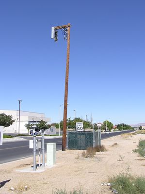 The Leaning Tower of Victorville
Verizon's 3-sector wood pole is ever-so-slowly leaning over.  Victorville, California.
Keywords: victorville california verizon wood pole sector