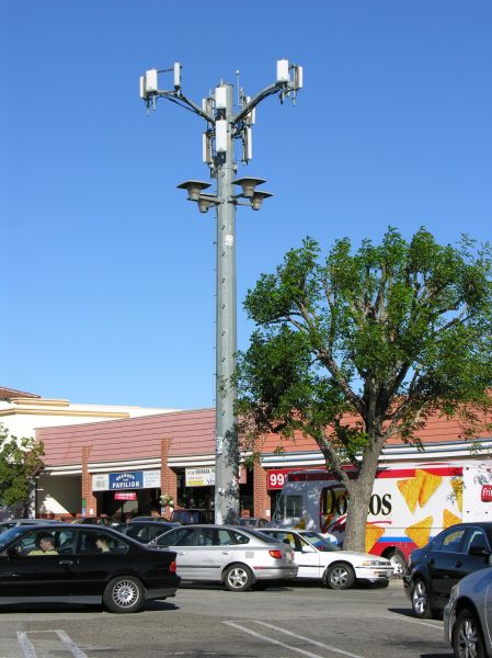 A well lit monolight brought to you by Verizon
...in the San Fernando Valley.  A Verizon site.  The base station equipment is located in one of the mall stores, which Verizon has taken over and added a new interior door.
Keywords: verizon monolight light standard parking lot san fernando valley