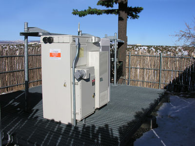 AT&T Monopine in Santa Fe, NM
AT&T's monopine site is above the 599 Bypass around Santa Fe, New Mexico (Mutt Nelson road).  Note the BTS cabintes are mounted on a raised grill (good for drainage; snow, etc.).
Keywords: att at&t monopine 599 bypass santa fe new mexico mut nelson road raised grill drainage snow