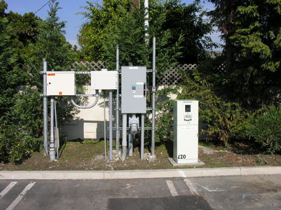T-Mobile's McDonald's Flagpole Site BTS Equipment
This is the ancillary equipment cabinets and panels (power, telephone; back-up power socket; etc.) that make the flagpole site in front of the McDonald's emit that popular PCS aroma. 
Keywords: t-mobile mcdonalds huntington beach antenna panels flagpole site bts cabinets h-frame
