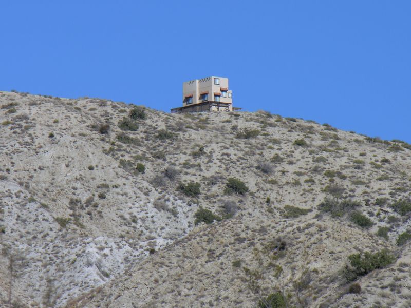 Wireless Adobe
Cingular's wireless adobe site on a bluff above California Highway 62 southeast of Yucca Valley, California.  It appears to be 'just another house on a hill' until you get up close and personal.  The site is owned by InterConnect Towers LLC (FCC ASR 1050520).
Keywords: cingular yucca valley california adobe interconnect towers llc