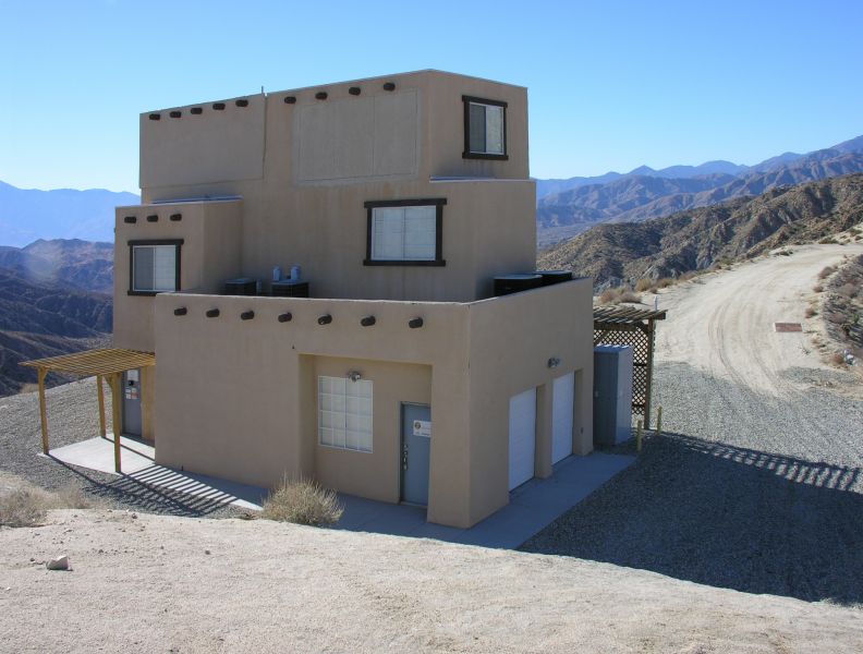 Wireless Adobe
Looking southwest to Cingular's wireless adobe site.  It's on a bluff above California Highway 62 southeast of Yucca Valley, California.  It appears to be 'just another house on a hill' until you get up close and personal.  The site is owned by InterConnect Towers LLC (FCC ASR 1050520).
Keywords: cingular yucca valley california adobe interconnect towers llc