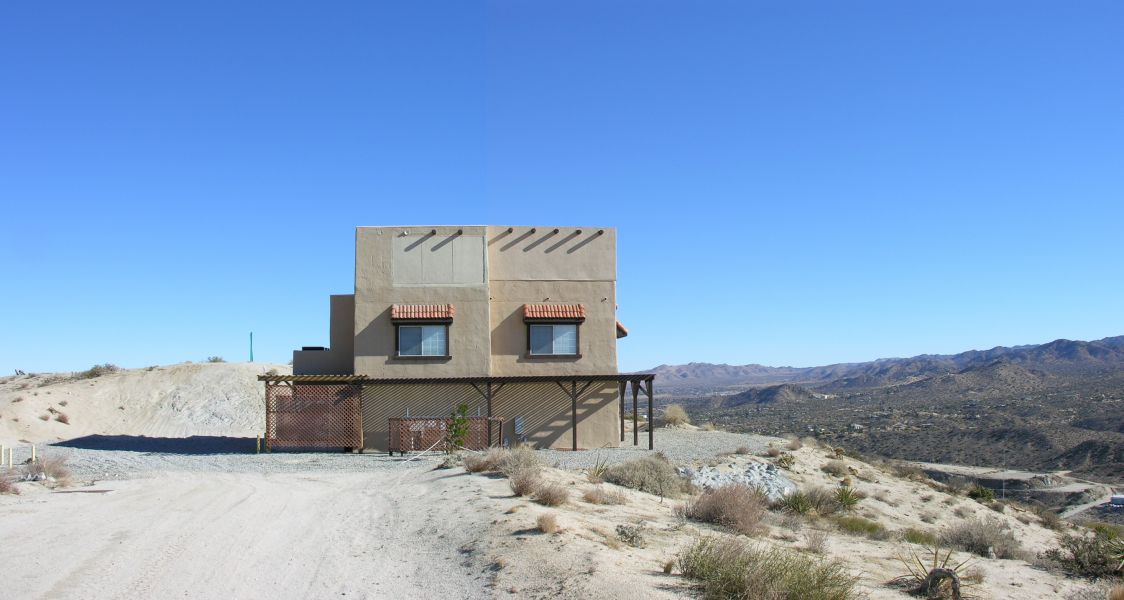 A high resolution detail show of Cingular's wireless adobe site from the west side service road.  It's on a bluff above California Highway 62 southeast of Yucca Valley, California.  It appears to be 'just another house on a hill' until you get up close and personal.  The site is owned by InterConnect Towers LLC (FCC ASR 1050520).
Keywords: cingular yucca valley california adobe interconnect towers llc