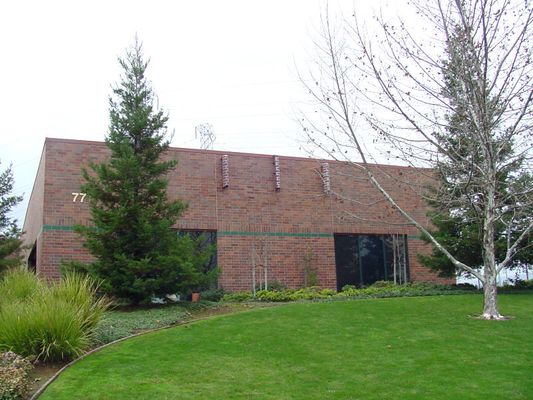 Camo-ish on-building cell site
This is an example of how surface mounted antennas can be detailed to blend, if not disappear, into the background of the structure.
Keywords: surface mounted camo