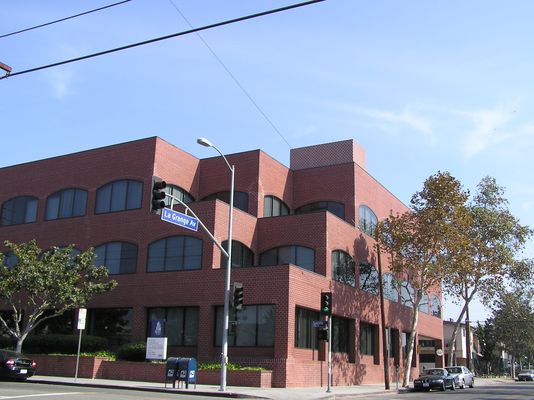 Mismatched Bricks
Here is an example of a faux building extension with a poorly matched 'brick' facing.  There's no doubt that this design does not effectively hide the antennas behind the faux brick facing. Notice that no effort was made to match the brick patter of the underlying building thereby highlighting the 'out of place' nature of the extension.

Keywords: faux brick facing poor