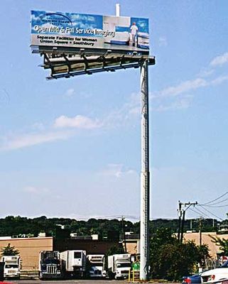 Sign of the times (1 of 2)
The cell site antenna is seen at the top of the outdoor advertising sign.  Spotted in Connecticut.
Keywords: outdoor advertising sign connecticut