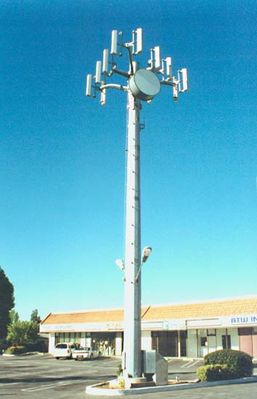 Cell site in parking lot
Notice the addition of the lot lights. 
