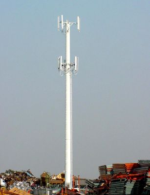 Co-location cell site
The lower array was added after the tower was constructed.  How do we know? Many of the cables for that array are mounted on the outside of the pole on the righthand side.  
Keywords: after the fact