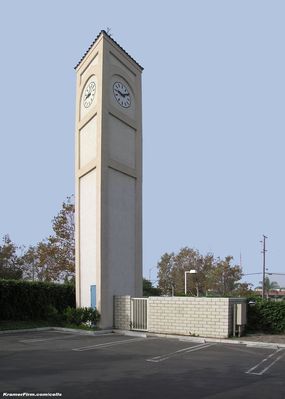 What time is it? It's Cingular Time!
Here's an attractive Cingular Wireless clock tower cell site in Buena Park, California.  The BTS equipment is located at ground level behind the block wall.
Keywords: clock tower cingular buena park