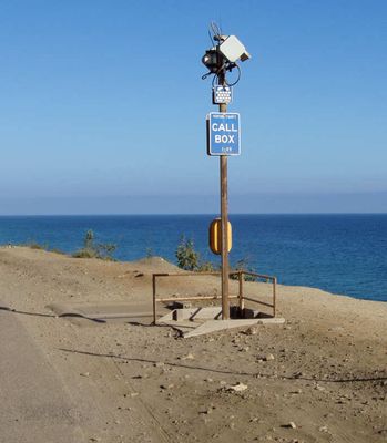 Cell site on a Call Box
This cell site uses a travelers call box as the antenna support.  The equipment is located just beyond the railing in the underground enclosure.  Near Pt. Mugu, California.
Keywords: call box cell