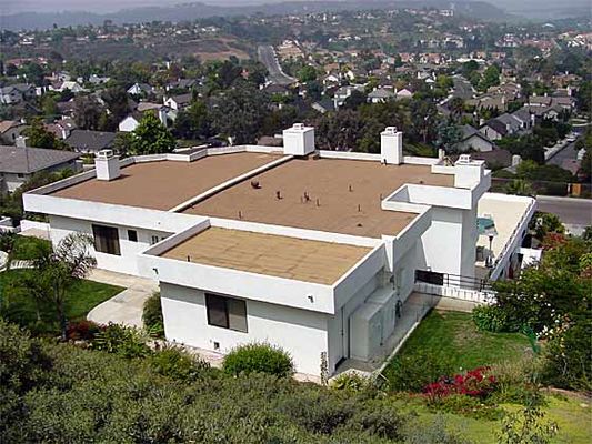 Faux chimney antenna site 1 of 2
The antennas are in a faux chimney.  The base station equipment is adjacent to the house in the lower right portion of the photo.  Spotted in Southern California.
Keywords: Faux chimney camouflaged home house