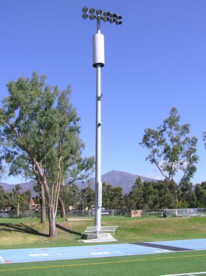 Nextel Field Light Standard Radome Antenna Mount
Nextel's Santa Margarita Christian High School site (Rancho Rancho Santa Margarita, California) uses a field light standard to support the antennas, and the radome that covers those antennas.  

The mountain in the background/right of the field light standard is Santiago Peak, the key radio site in Orange County, California.
Keywords: nextel Rancho Santa Margarita Christian high school radome field light standard Santiago Peak