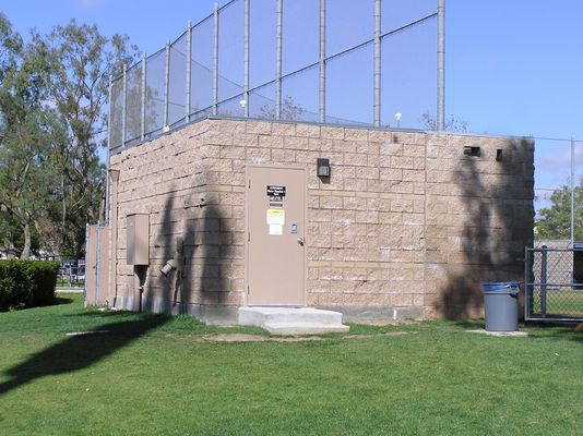 Nextel BTS Equpment Shelter
This is the BTS equipment shelter for Nextel's Santa Margarita Christian High School site (Rancho Rancho Santa Margarita, California).  This buidling is located adjacent to a baseball diamond to the east of the field light standard supporting the site antennas. 

Notice that the shadow of the field light standard and Radome are falling on the building.  Just a lucky shot! 
Keywords: nextel Rancho Santa Margarita Christian high school bts shelter