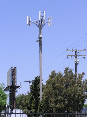 Side Saddle Microwave Dish Installation
Another view of this cell site which uses a microwave dish antenna system to provide backhaul to the MTSO.  The interesting note for this site is the side saddle (offset) installation of the dish antenna.  In most metro installations, a microwave antenna saves the carrier the cost of leasing a telco dataline, but at the expense of adding visual loading to the project.
Keywords: microwave side saddle carson california backhaul